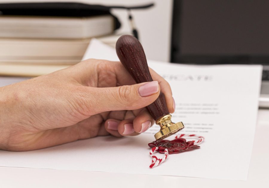 front-view-using-wax-seal-graduation-diploma-certificate